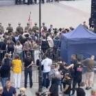 Zbigniew Komosa podczas przemówienia Andrzeja Dudy protestował z banerem 